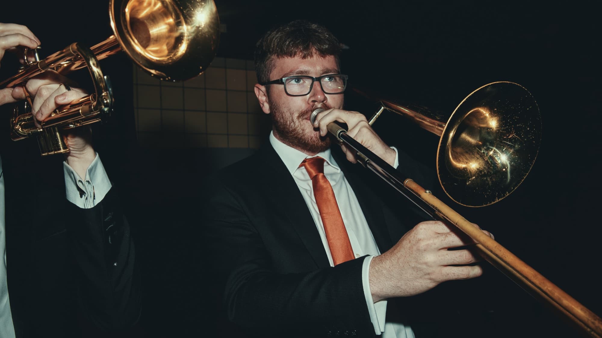 Trombone player mid-performance