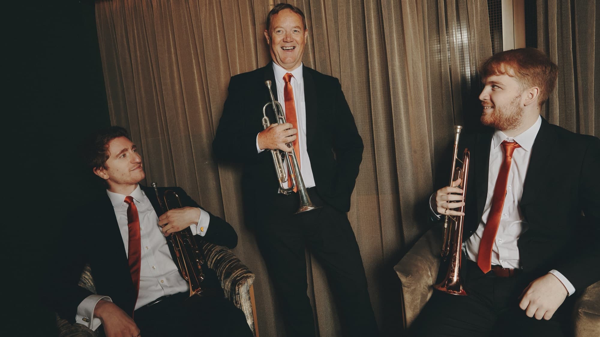 Trumpet players laughing